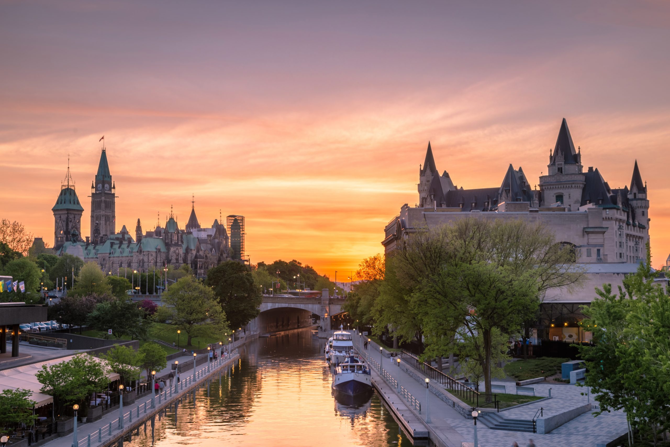 View of Parliament buildings from Plaza Bridge Ottawa during sunset